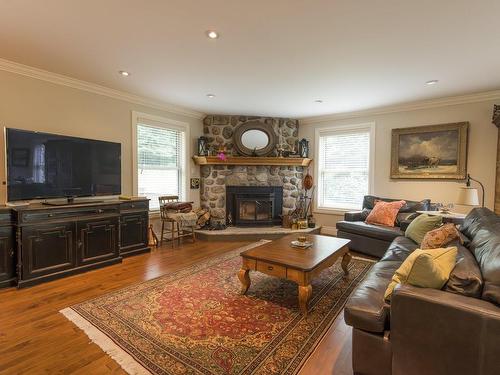 Living room - 7 Rue Eldridge, Lac-Brome, QC - Indoor Photo Showing Living Room With Fireplace