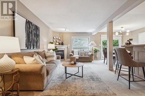 1261 Stephenson Drive, Burlington (Brant), ON - Indoor Photo Showing Living Room With Fireplace