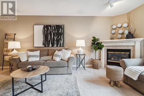 1261 Stephenson Drive, Burlington (Brant), ON - Indoor Photo Showing Living Room With Fireplace