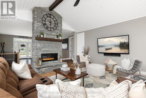 450 Fowlers Road, Huntsville, ON - Indoor Photo Showing Living Room With Fireplace