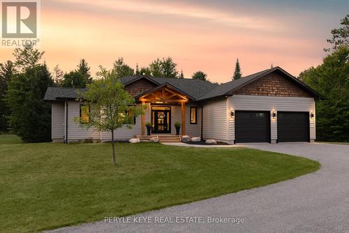 450 Fowlers Road, Huntsville, ON - Outdoor With Facade