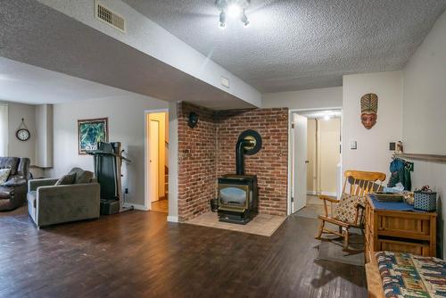 1415 Earl Street, Rossland, BC - Indoor Photo Showing Living Room With Fireplace