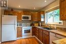 1415 Earl Street, Rossland, BC  - Indoor Photo Showing Kitchen With Double Sink 