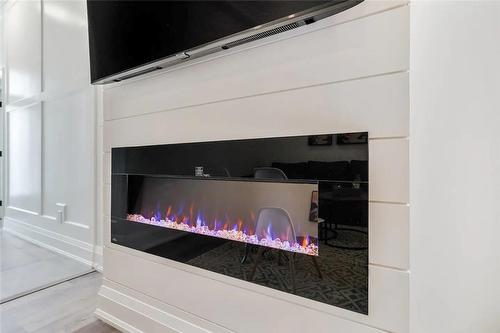 5 Florence Street, Hamilton, ON - Indoor Photo Showing Other Room With Fireplace