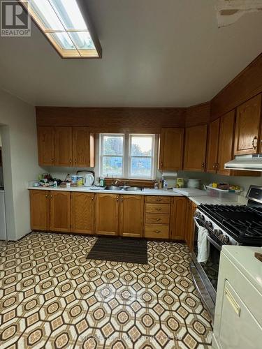 140 Victoria Avenue, Brock (Beaverton), ON - Indoor Photo Showing Kitchen With Double Sink