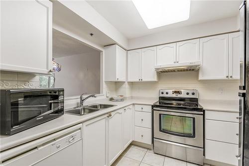 100 Burloak Drive|Unit #2405, Burlington, ON - Indoor Photo Showing Kitchen With Double Sink