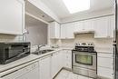 100 Burloak Drive|Unit #2405, Burlington, ON  - Indoor Photo Showing Kitchen With Double Sink 