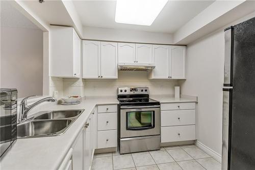 100 Burloak Drive|Unit #2405, Burlington, ON - Indoor Photo Showing Kitchen With Double Sink