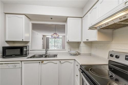 100 Burloak Drive|Unit #2405, Burlington, ON - Indoor Photo Showing Kitchen With Double Sink