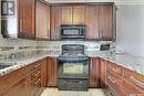 305 3750 Haughton Road E, Regina, SK  - Indoor Photo Showing Kitchen 