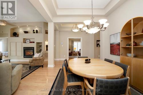 70 Arnie'S Chance, Whitchurch-Stouffville (Ballantrae), ON - Indoor Photo Showing Dining Room With Fireplace