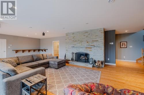 143 Summit Drive, Paradise, NL - Indoor Photo Showing Living Room With Fireplace