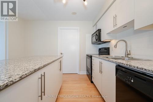 1745 - 35 Viking Lane, Toronto (Islington-City Centre West), ON - Indoor Photo Showing Kitchen With Double Sink