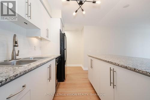 1745 - 35 Viking Lane, Toronto (Islington-City Centre West), ON - Indoor Photo Showing Kitchen With Double Sink