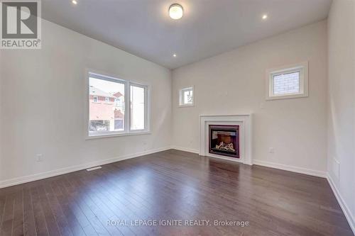 56 Rustle Woods Avenue, Markham (Cornell), ON - Indoor Photo Showing Living Room With Fireplace