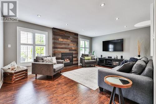 251 Sirente Drive, Hamilton (Crerar), ON - Indoor Photo Showing Living Room With Fireplace