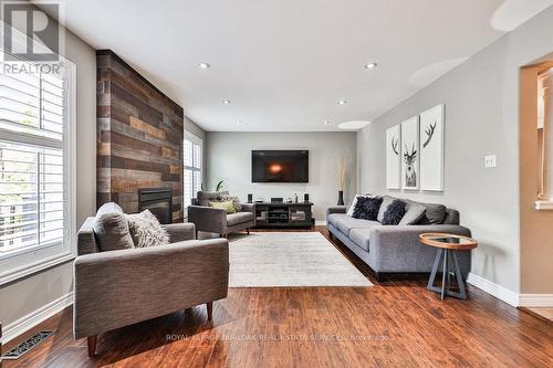 251 Sirente Drive, Hamilton (Crerar), ON - Indoor Photo Showing Living Room With Fireplace