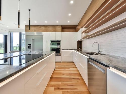 Cuisine - 10 Rue Pierre, Repentigny (Repentigny), QC - Indoor Photo Showing Kitchen With Upgraded Kitchen