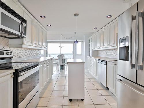 Cuisine - 1207-7630 Rue Du Mans, Montréal (Saint-Léonard), QC - Indoor Photo Showing Kitchen With Upgraded Kitchen