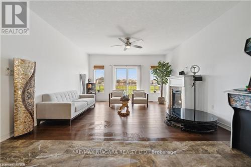 4432 Cinnamon Grove, Niagara Falls, ON - Indoor Photo Showing Living Room With Fireplace