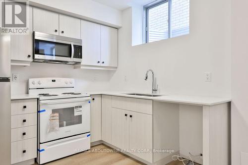 24 Broddy Avenue, Brantford, ON - Indoor Photo Showing Kitchen With Double Sink