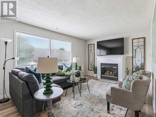 G - 164 Henry Street, Brantford, ON - Indoor Photo Showing Living Room With Fireplace