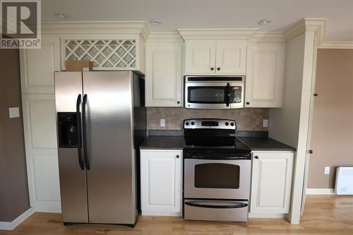 2-4 Old Cove Road, Rocky Harbour, NL - Indoor Photo Showing Kitchen