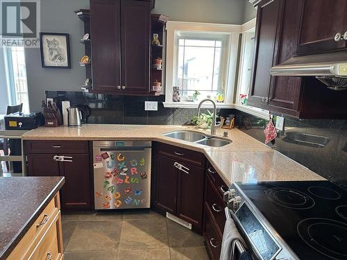 1844 88 Avenue, Dawson Creek, BC - Indoor Photo Showing Kitchen With Double Sink