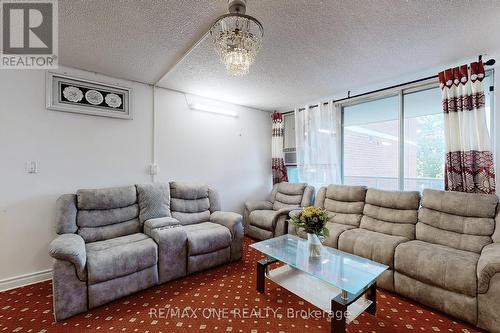 410 - 100 Wingarden Court, Toronto (Malvern), ON - Indoor Photo Showing Living Room