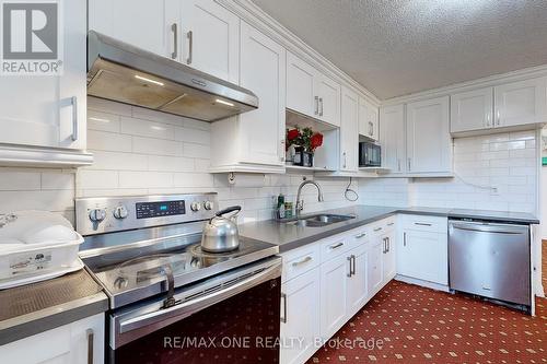 410 - 100 Wingarden Court, Toronto (Malvern), ON - Indoor Photo Showing Kitchen With Stainless Steel Kitchen With Double Sink