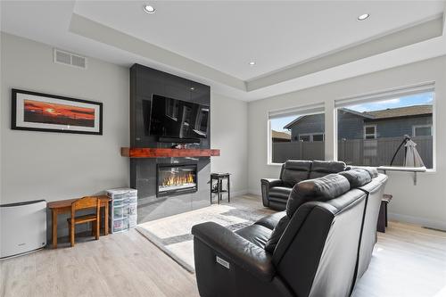 2237 Rahn Street, Armstrong, BC - Indoor Photo Showing Living Room With Fireplace