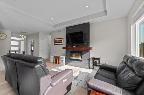 2237 Rahn Street, Armstrong, BC - Indoor Photo Showing Living Room With Fireplace