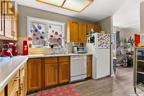 201 2727 Victoria Avenue, Regina, SK - Indoor Photo Showing Kitchen With Double Sink