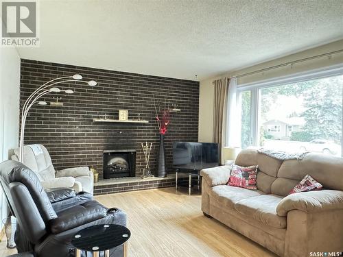 2114 37Th Street W, Saskatoon, SK - Indoor Photo Showing Living Room With Fireplace