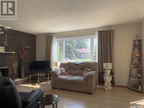 2114 37Th Street W, Saskatoon, SK - Indoor Photo Showing Living Room With Fireplace