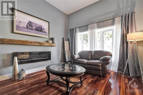 11 Alder Crescent, Ottawa, ON - Indoor Photo Showing Living Room With Fireplace