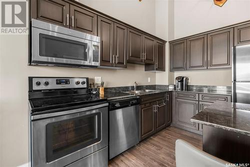 405 710 Hart Road, Saskatoon, SK - Indoor Photo Showing Kitchen With Stainless Steel Kitchen With Double Sink