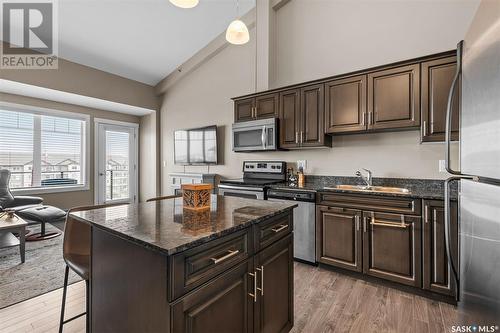 405 710 Hart Road, Saskatoon, SK - Indoor Photo Showing Kitchen With Stainless Steel Kitchen With Double Sink