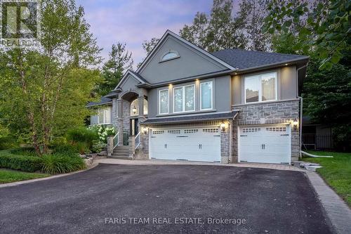 2 Reillys Run, Springwater (Minesing), ON - Outdoor With Facade