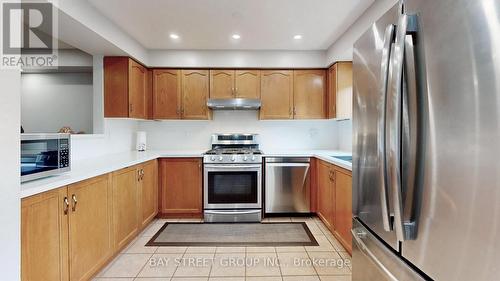 202 - 80 Acorn Place, Mississauga (Hurontario), ON - Indoor Photo Showing Kitchen With Stainless Steel Kitchen