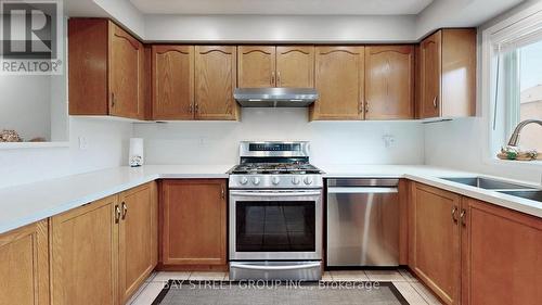 202 - 80 Acorn Place, Mississauga (Hurontario), ON - Indoor Photo Showing Kitchen With Double Sink