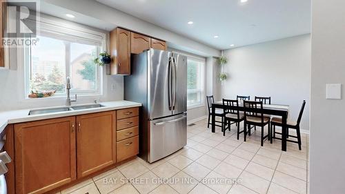 202 - 80 Acorn Place, Mississauga (Hurontario), ON - Indoor Photo Showing Kitchen With Double Sink