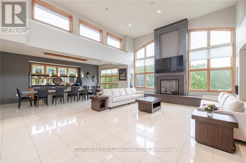 60 Sir Robert Place, Middlesex Centre (Arva), ON - Indoor Photo Showing Other Room With Fireplace