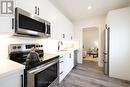 5 Florence Street, Hamilton (Strathcona), ON  - Indoor Photo Showing Kitchen With Double Sink 