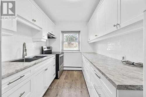 107 - 9 Grant Boulevard, Hamilton, ON - Indoor Photo Showing Kitchen With Double Sink