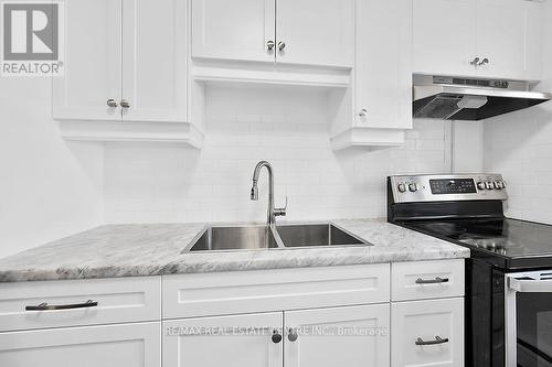 107 - 9 Grant Boulevard, Hamilton, ON - Indoor Photo Showing Kitchen With Double Sink With Upgraded Kitchen