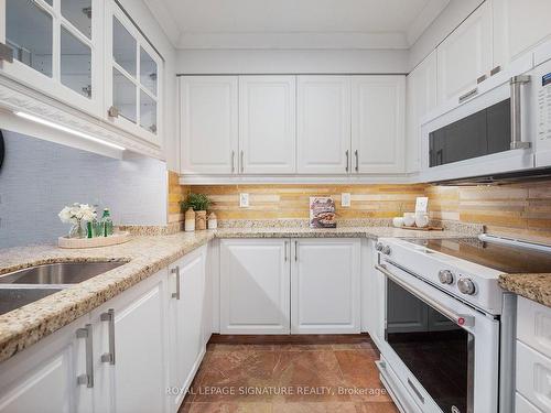 303-887 Bay St, Toronto, ON - Indoor Photo Showing Kitchen With Double Sink