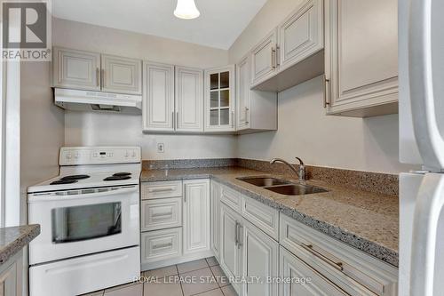 1505 - 2263 Marine Drive, Oakville (Bronte West), ON - Indoor Photo Showing Kitchen With Double Sink