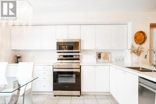 102 - 3108 Eglinton Avenue W, Mississauga (Churchill Meadows), ON - Indoor Photo Showing Kitchen With Double Sink