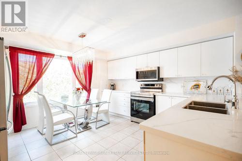 102 - 3108 Eglinton Avenue W, Mississauga (Churchill Meadows), ON - Indoor Photo Showing Kitchen With Double Sink